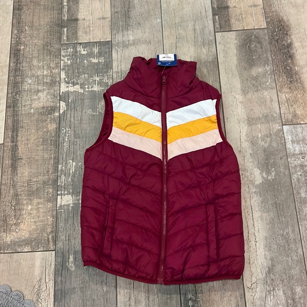 Super cute girls vest, warm, and cozy for Winter pockets in the front.